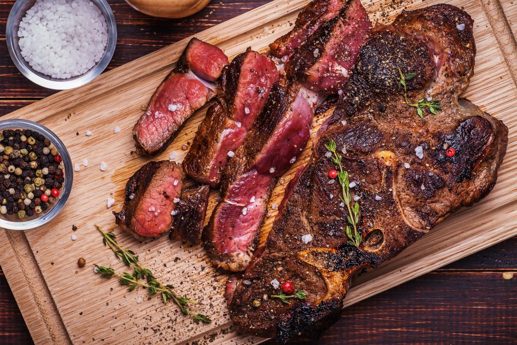 Beef,Steak,On,A,Wooden,Background
